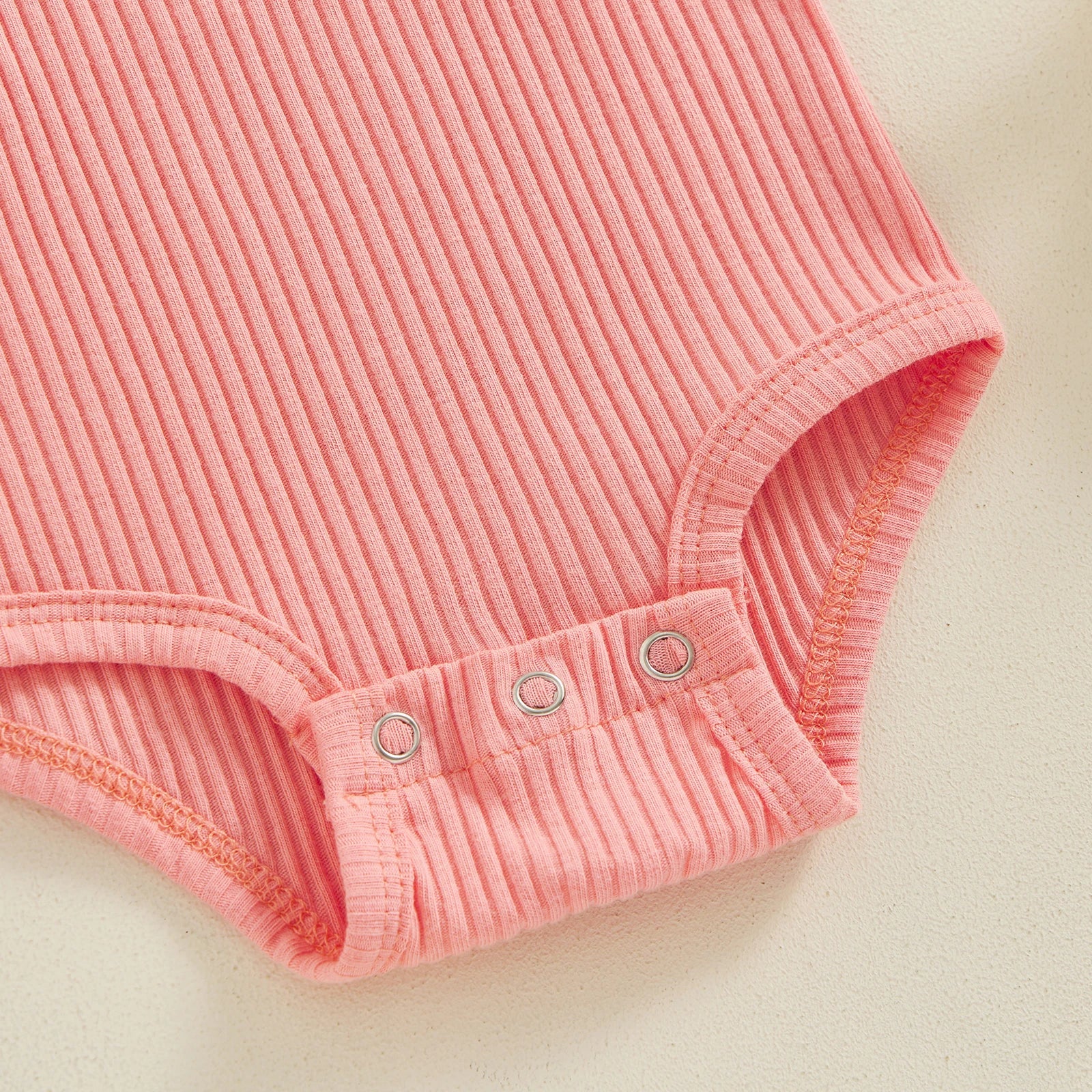 Ribbed Ruffles Solid Onesie
