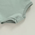 Solid Ruffle Long Sleeve Onesie