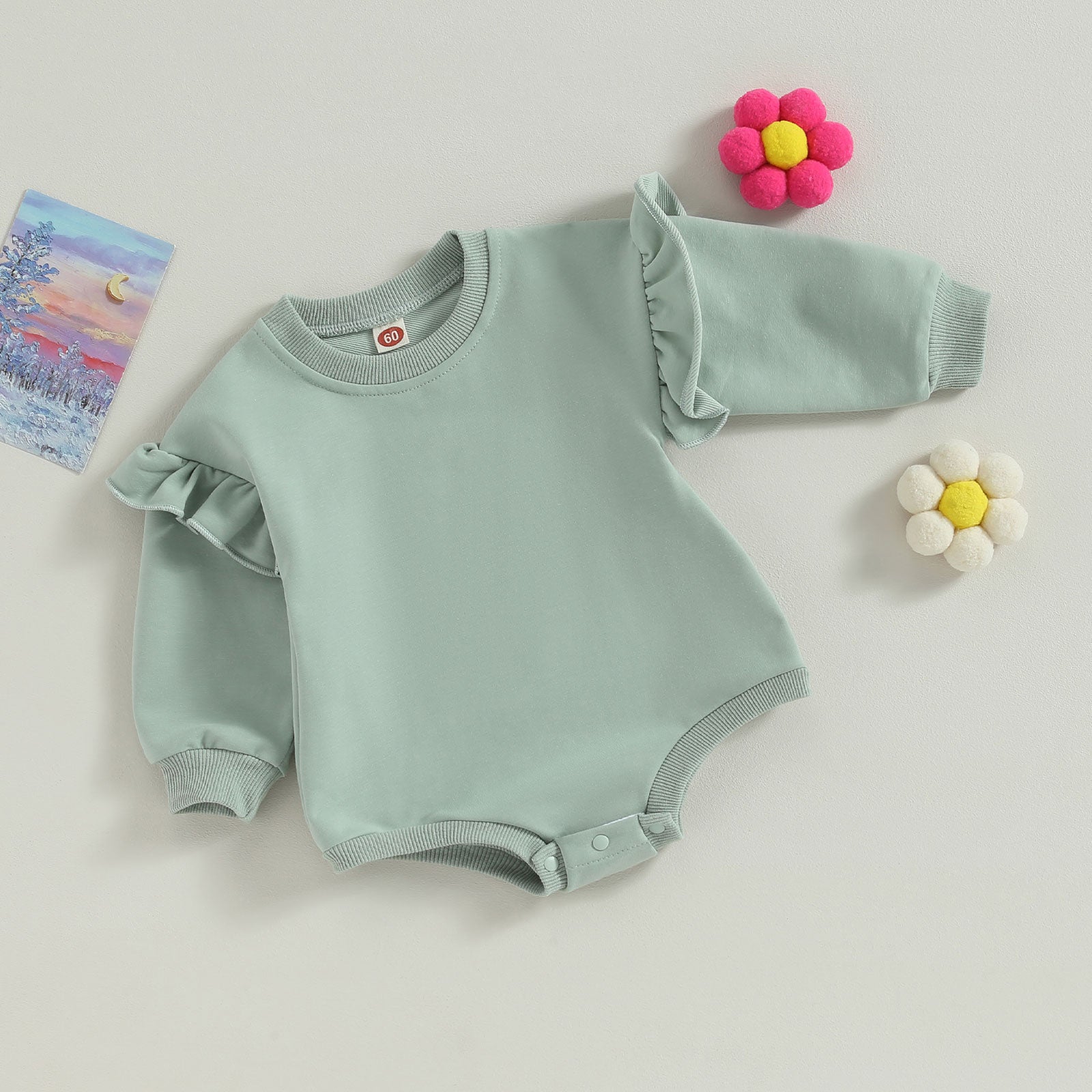 Solid Ruffle Long Sleeve Onesie